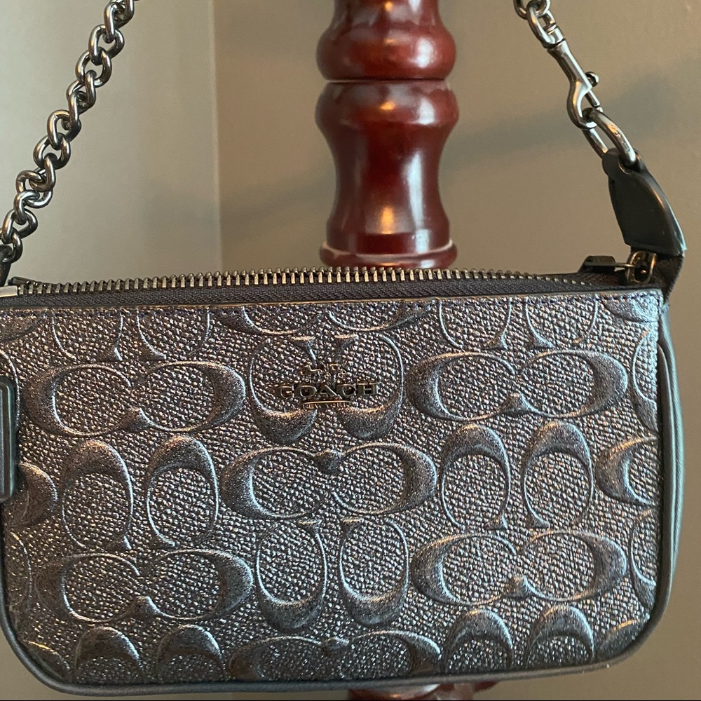 Small metallic black coach purse/ wristlet